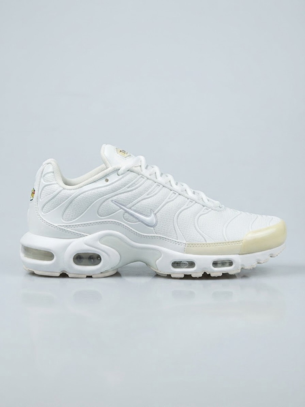 Nike White Women's Running Sneakers with Cream Toe Accent